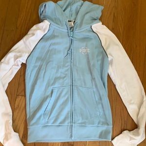 Victoria’s Secret pink baby blue with white sleeves and pink logo